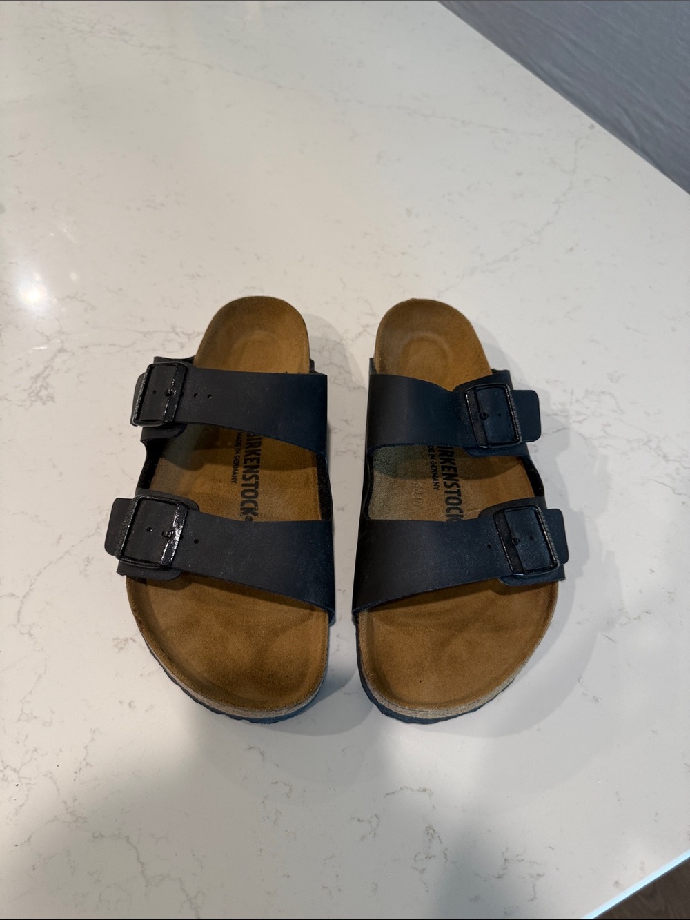 Birkenstock Black Arizona Two-Strap Men’s Sandals with Brown Footbed